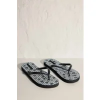 Ysabel Mora Black Flower teenslippers in zwart en wit