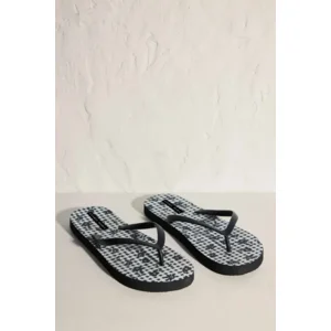 Ysabel Mora Black Flower teenslippers in zwart en wit