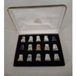 Lindner Bavaria porzellan 	Doos 15 stuks vingerhoedjes mix			Handarbeid